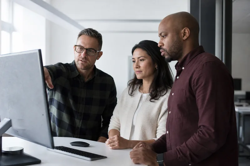 Hiring team reviewing a ranked candidate shortlist together